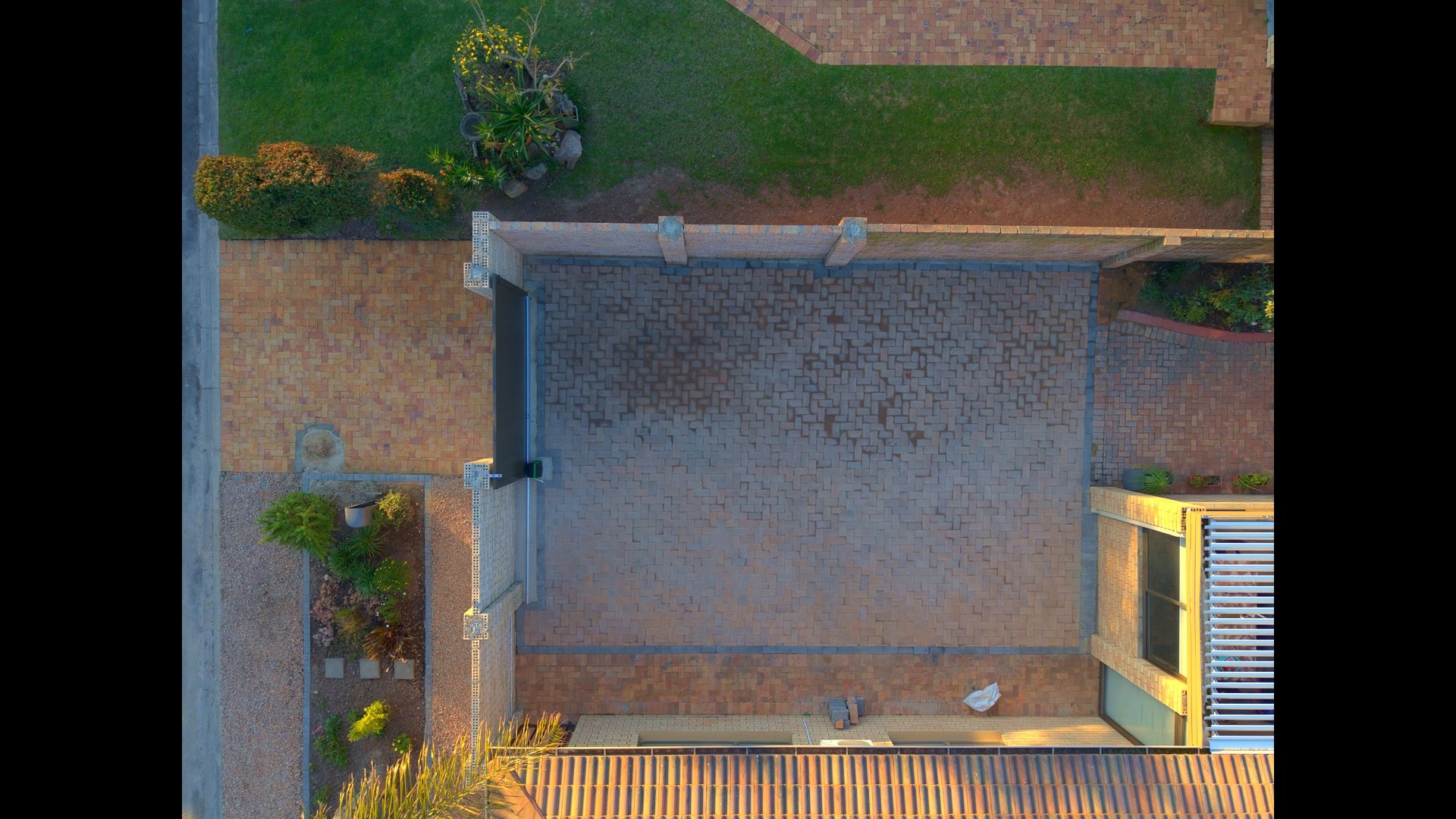 Construction progress — finished paved courtyard