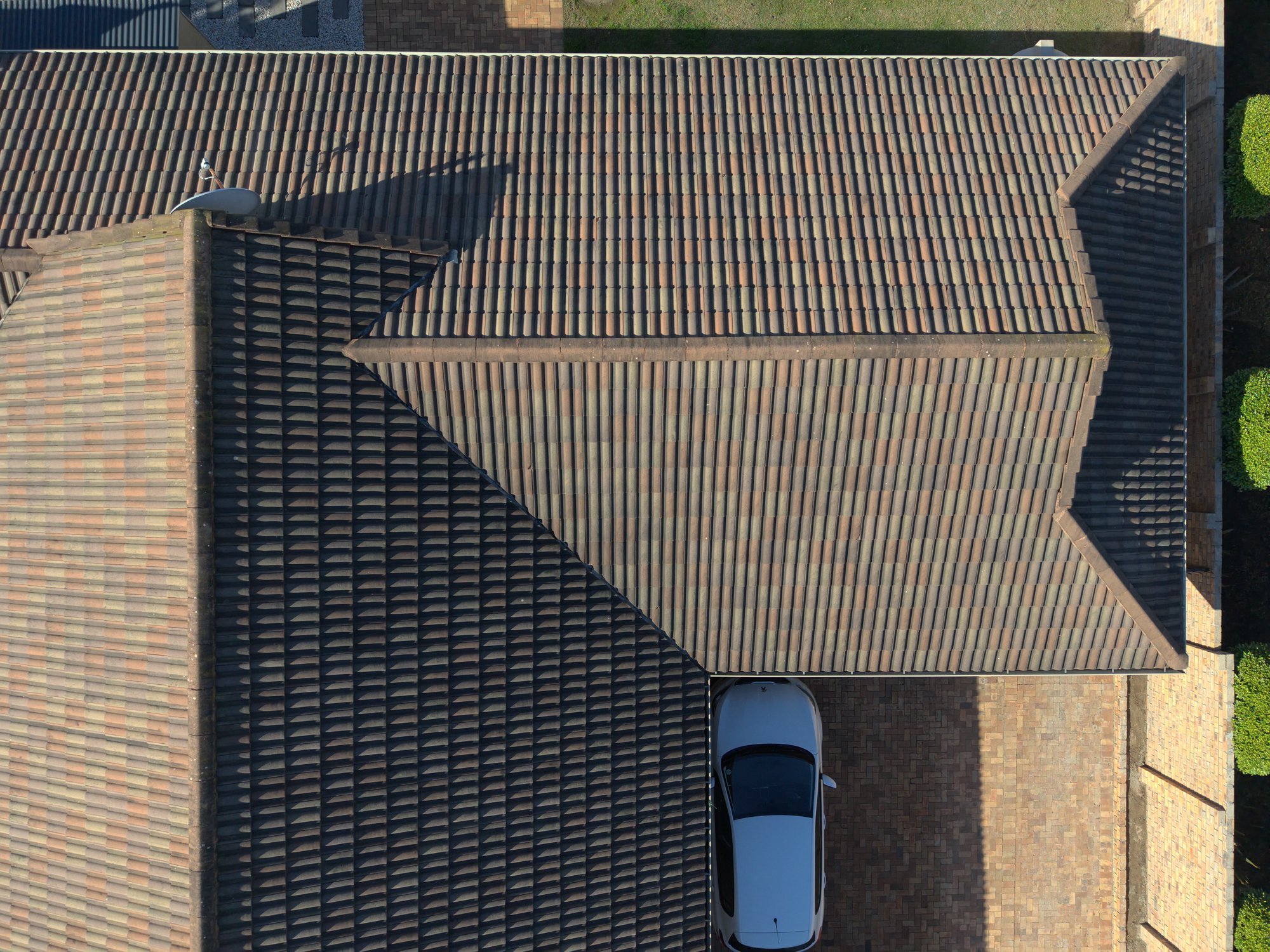 Aerial roof inspection — full property roofline